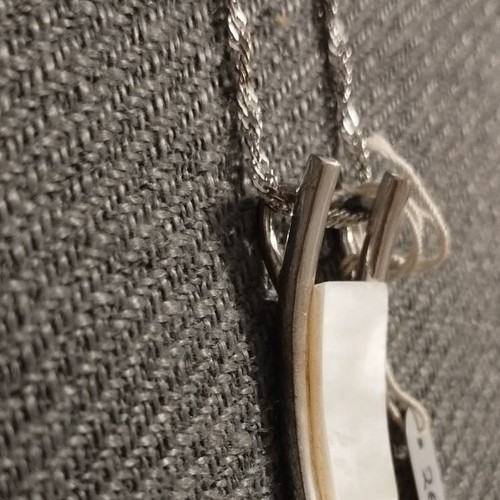 Silver women's necklace with minimal geometric pendant