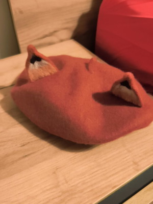 Beret tan color with fox-like ears like new