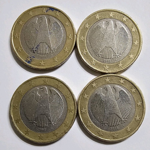 Coins used, 4 German 1 euro with mint error