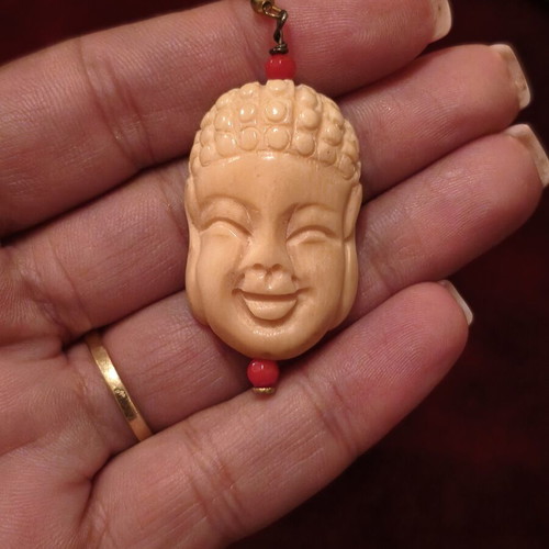 Vintage Laughing Buddha earrings, cream with red beads