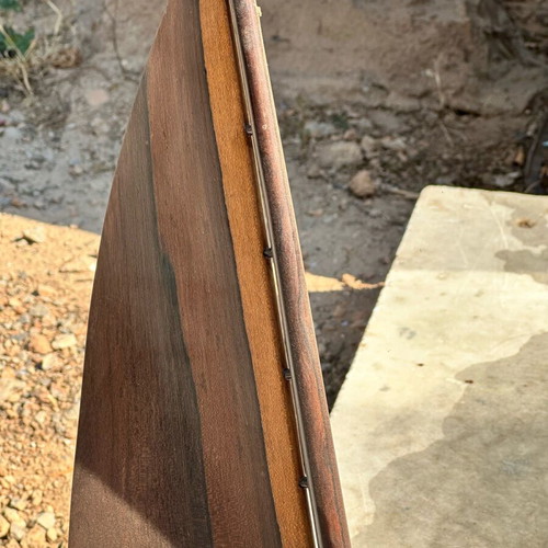 Handmade wooden sailboat used on base, modern nautical decoration