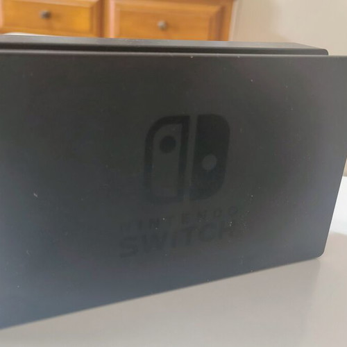 Nintendo Switch console with accessories and carrying case