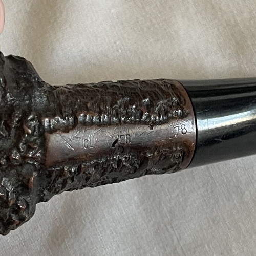 Handmade Czech wooden smoking pipe used with signs of wear