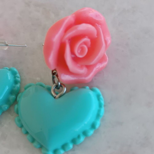 Plastic handmade earrings like new with box now