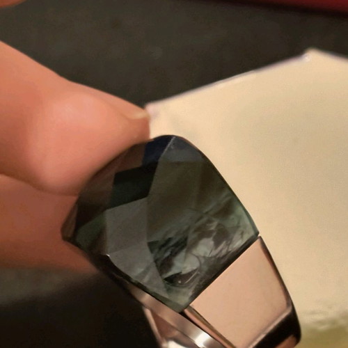 Steel ring used with green glass