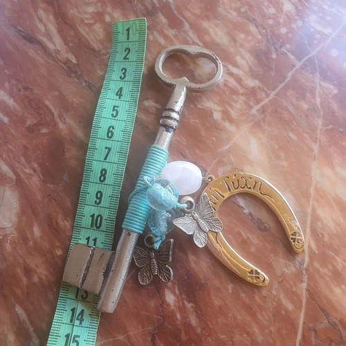 Lucky key charm with horseshoe