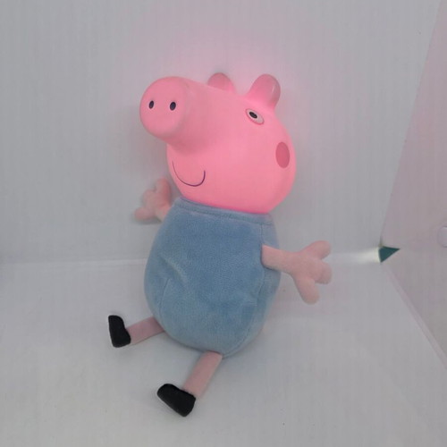 George plush toy used, lights and sounds