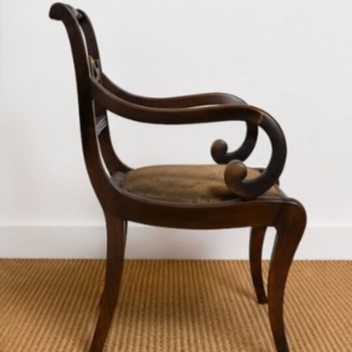 Vintage solid wood armchair with carved back used