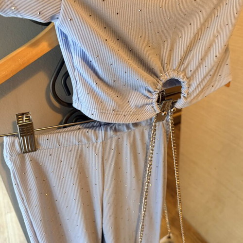 Turquoise set with pants, top and rhinestone bag