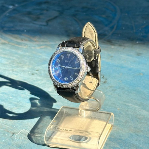 Vintage Pearl wristwatch with blue dial and stones
