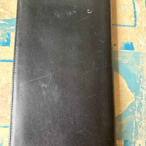 Large leather wallet used with multiple compartments, black