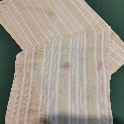 Woven bed sheet used with stain and wear from 1930 era