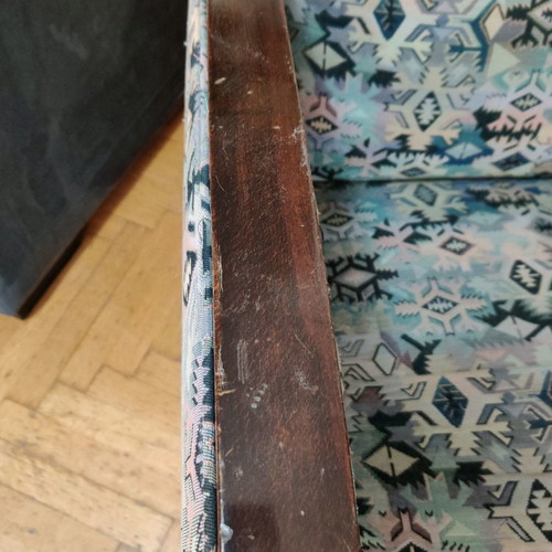 Armchair used made of good wood with fabric cover