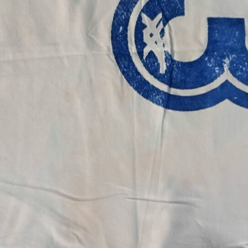 Vintage Asics 90s graphic t-shirt, white with green and blue sleeves