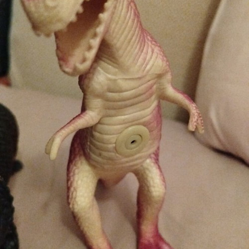 Dinosaur figures like new with sound valve in belly