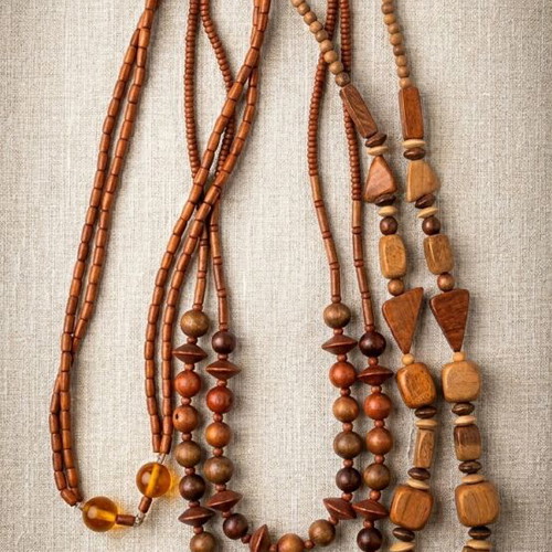 Set of 3 wooden necklaces, brown tones