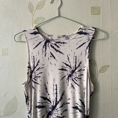 White elastic dress with unique design and side ties, like new, sizes S/M