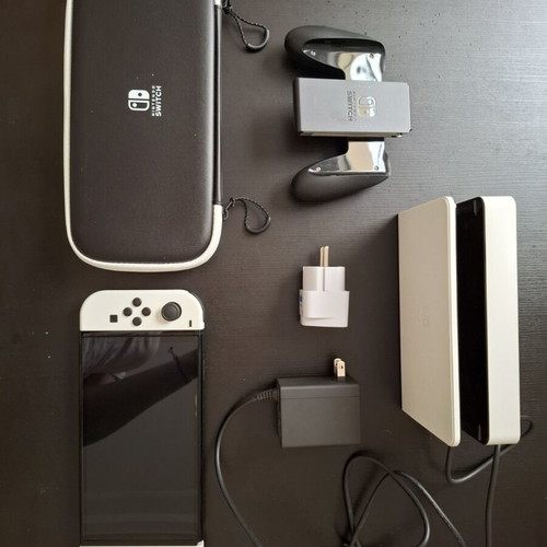 Nintendo Switch like new with original accessories and Super Mario Bros Wonder