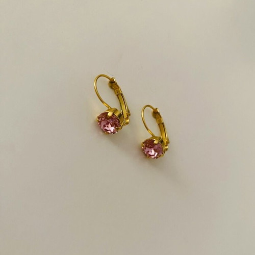 Earrings used, gold color with pink stone