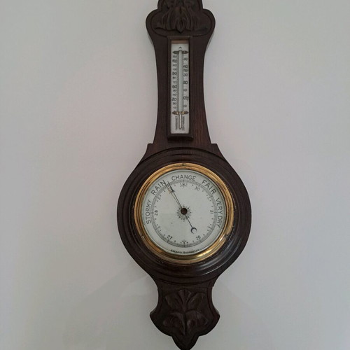 Vintage aneroid barometer with thermometer used, hand-carved wood case
