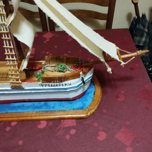 Handmade sailboat on base new with three masts