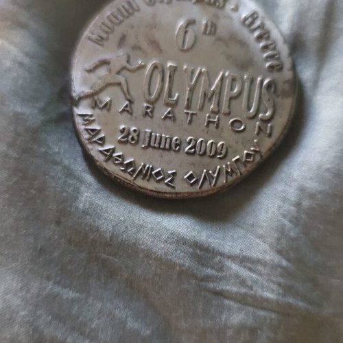Olympus Marathon 2009 medal like new, authentic finishers medal
