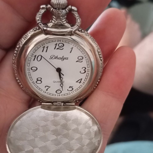 Dhalya pocket watch like new with intricate designs and new battery