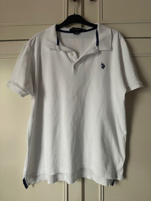 U.S. POLO ASSN M men's white polo shirt used with small hole