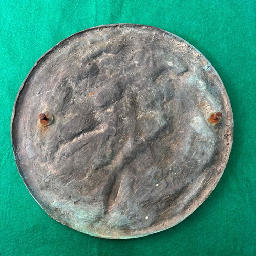 Circular relief sculpture by Nikolas Pavlopoulos used, bronze depicting Pan and a Maenad