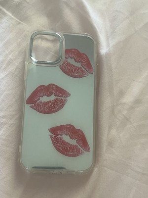 iPhone 13 case with mirror surface and red lips design