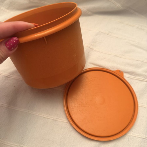 Tupperwear vintage deep circle orange container with lid used