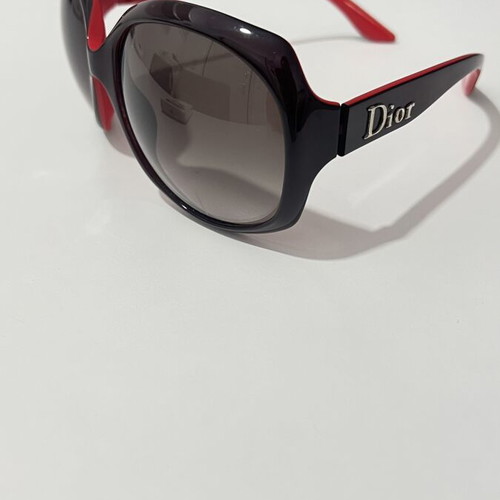 Christian Dior sunglasses used, black and red frame, lens scratched