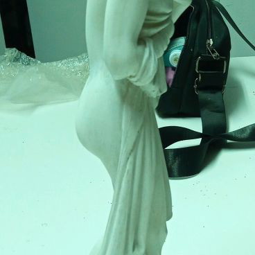 Statue of semi-nude bathing woman used, height 39cm