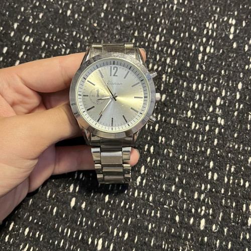 Xianan Quartz wristwatch unisex, like new, silver bracelet
