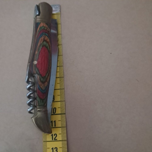 Vintage folding knife like new with multicolored wood handle
