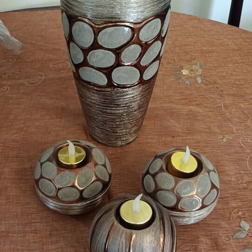 Brown vase and 3 brown tealight holders like new