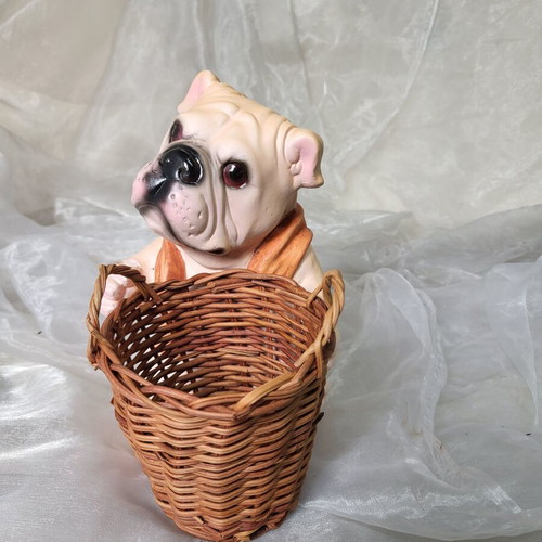 Decorative dog figure with basket