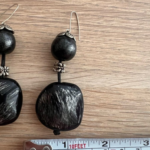 Women's hanging earrings used