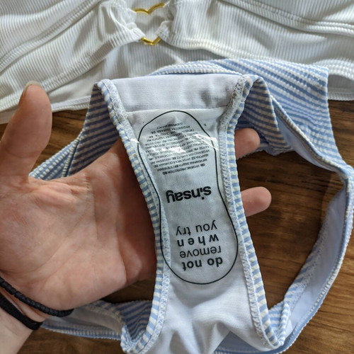 Bikini new, white top with gold heart details and baby blue bottom XS