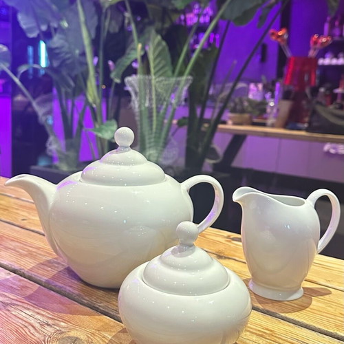 Porcelain teapot, creamer and sugar bowl set new