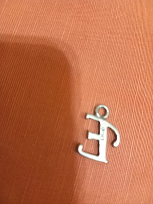Silver pendant with letter E used