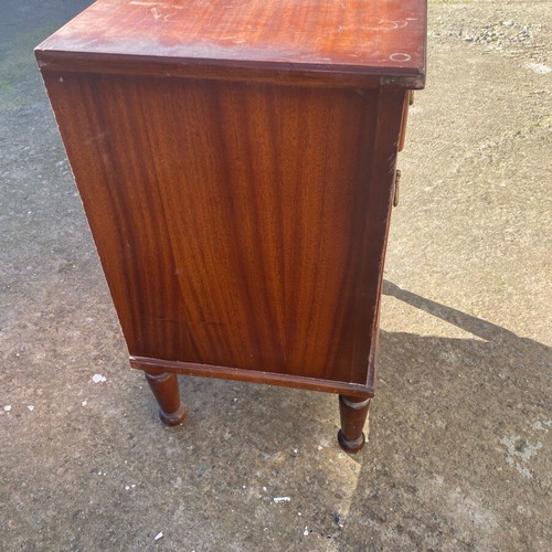 Wooden bedside cabinet used with drawer and cupboard
