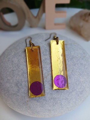 Handmade earrings with purple and gold resin