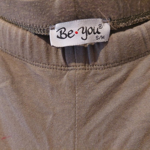 Be you khaki leggings used with black and rips S/M