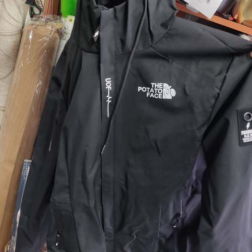 Black waterproof windbreaker jacket, men's size L