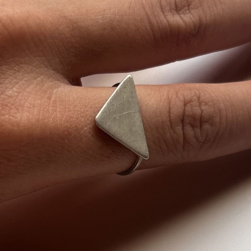 Triangular brass ring like new with thin band and textured finish