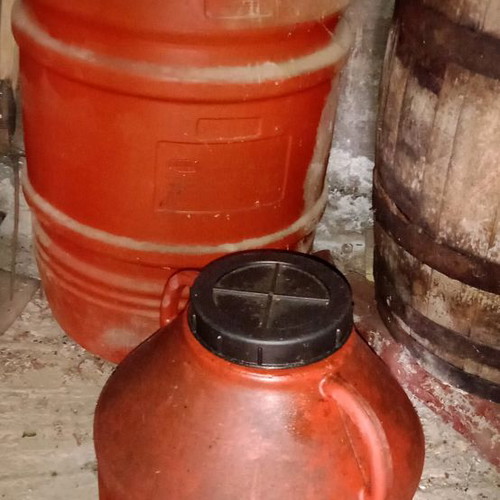 Oil containers used, one large 200kg and one smaller