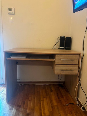 Wooden desk with sliding shelf and 2 drawers, like new