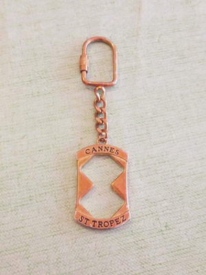 French Riviera Vintage Collectible Keychain Bottle Opener used, bronze copper