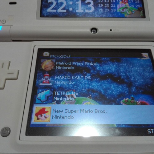 Nintendo DSi console used with Acekard 2i and 2GB microSD